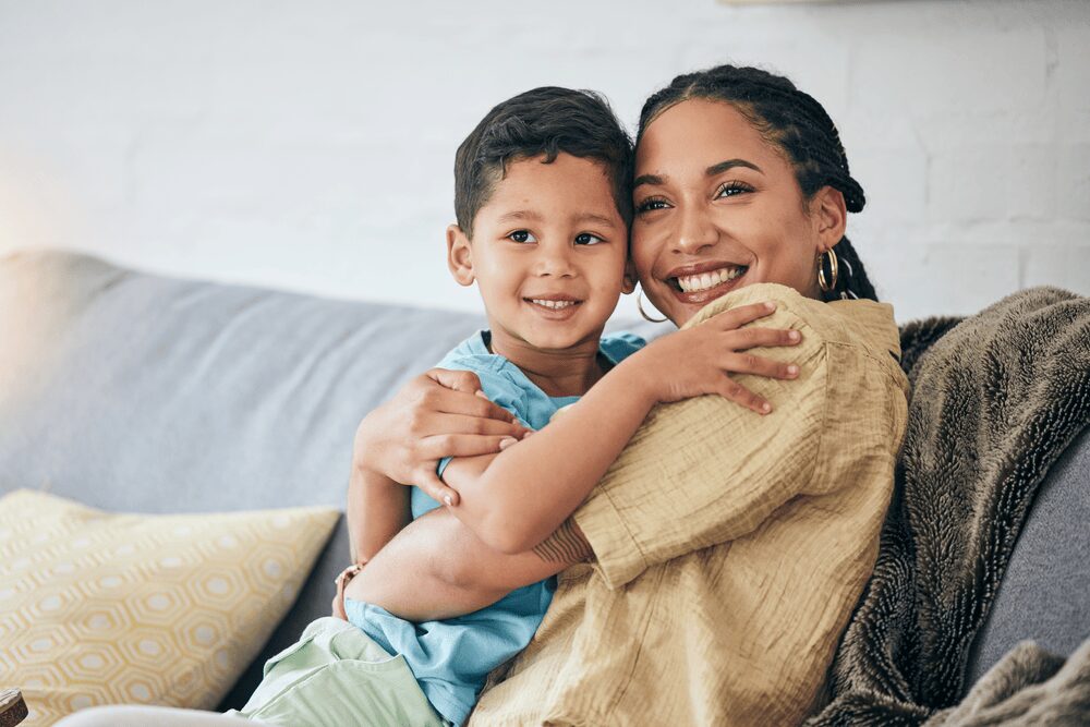 mother hugging her child after a home drug kit mother hugging her child after using a home drug kit